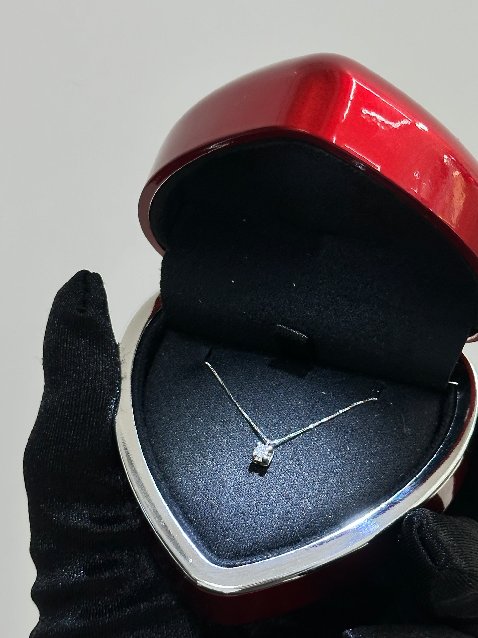 COLLANA PUNTO LUCE CON DIAMANTE ORO 18KT