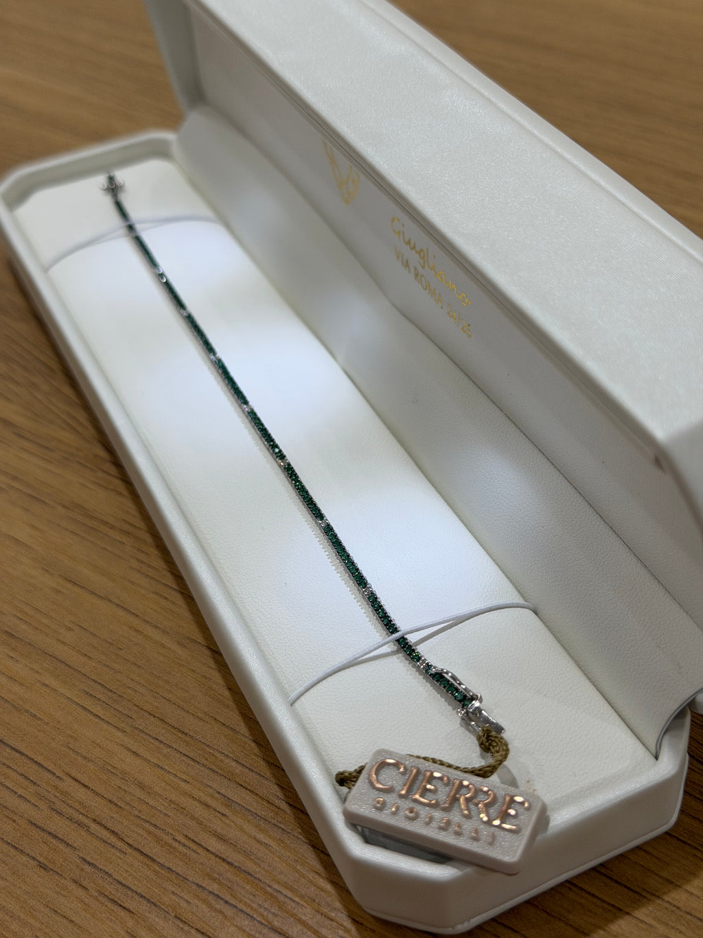 BRACCIALE TENNIS IN ORO 18KT DIAMANTI E SMERALDI