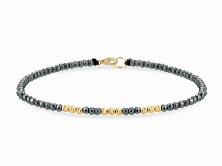 BRACCIALE A LACCIO CON EMATITE E SFERE IN ORO GIALLO DALU'