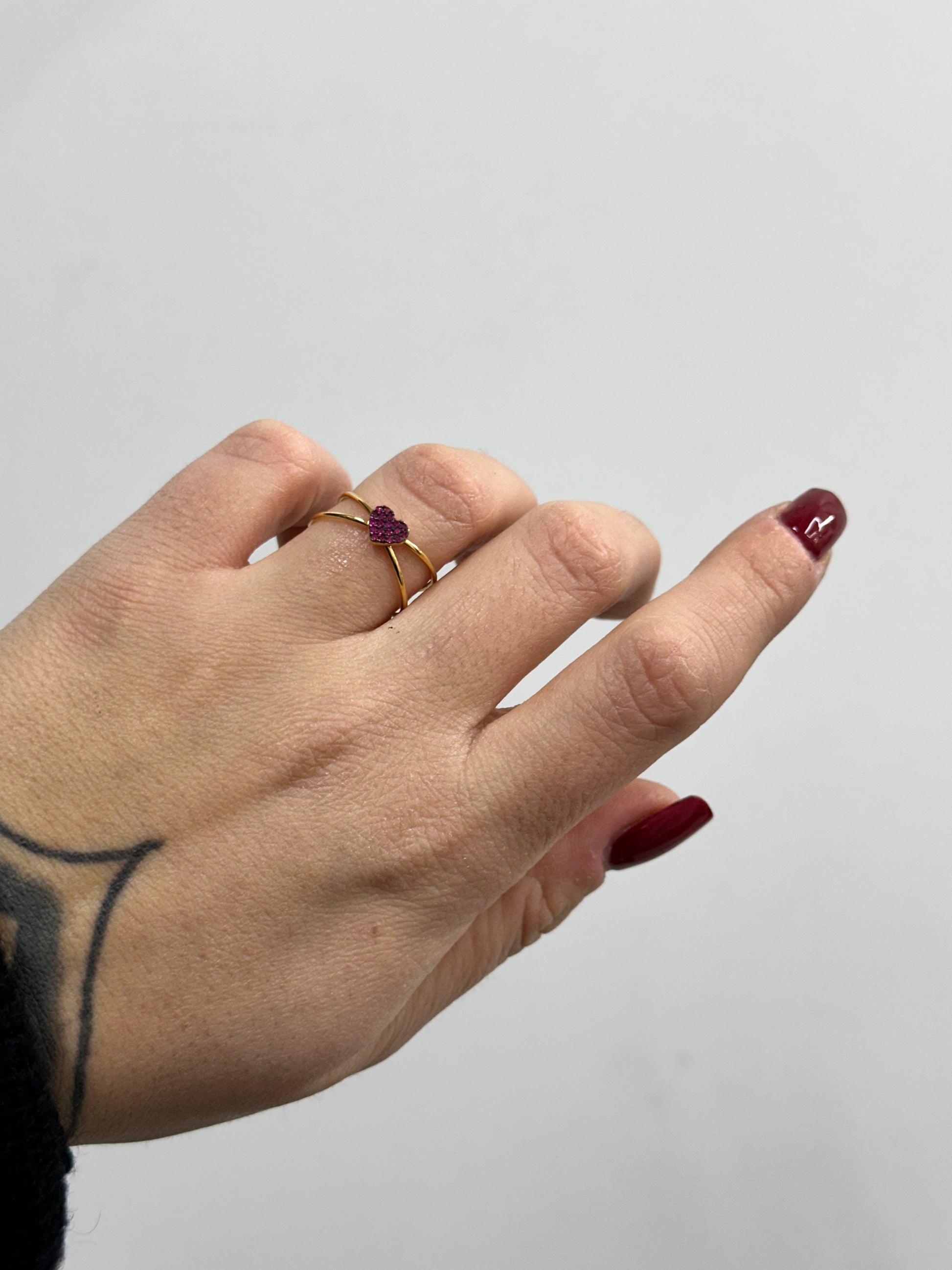 ANELLO INTRECCIO CON CUORICINO IN ORO 18KT