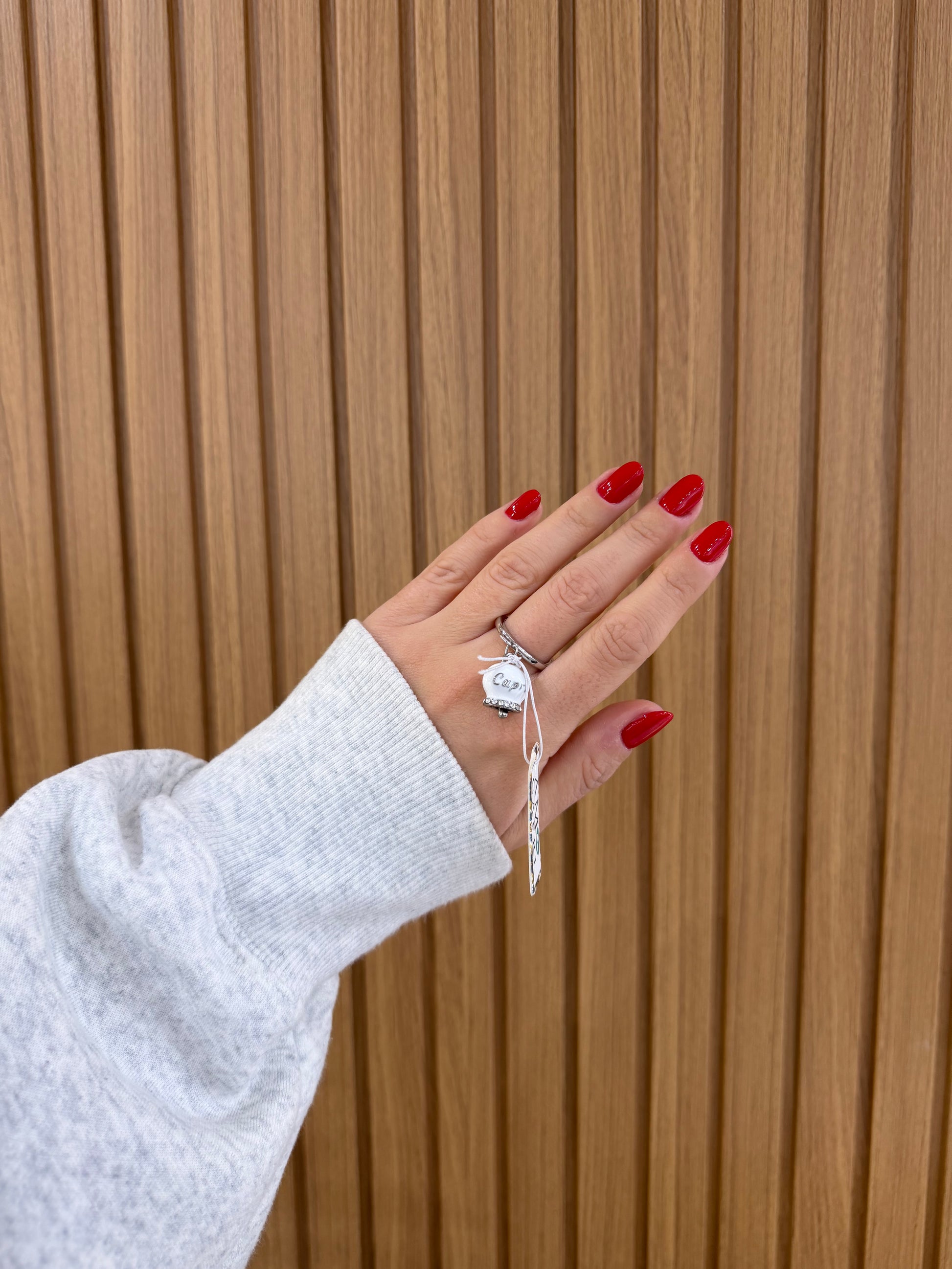 ANELLO AMO CAPRI IN ACCIAIO CAMPANELLA BIANCA