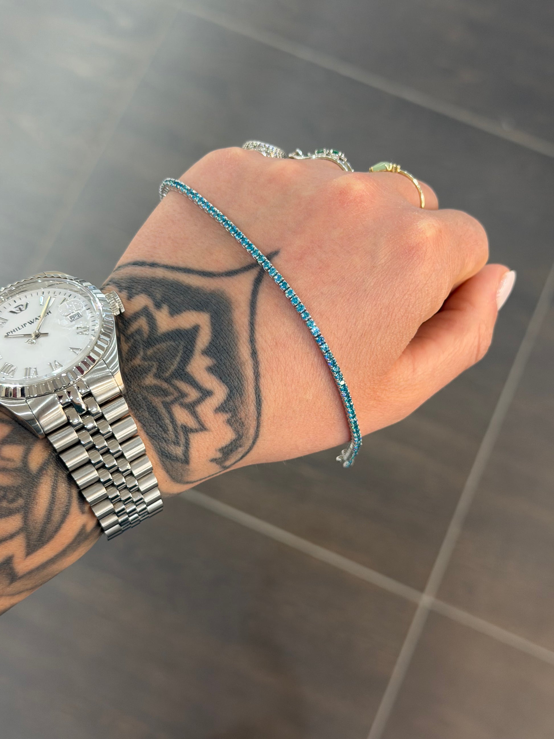 BRACCIALE TENNIS ORO 18KT CON ZIRCONI CELESTI