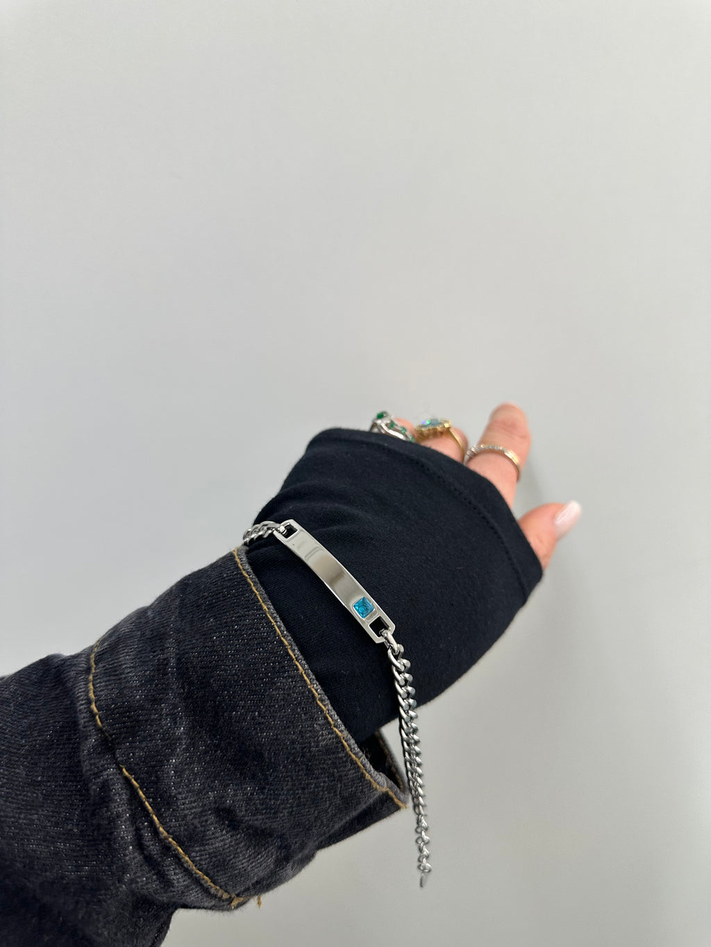 BRACCIALE ACCIAIO CON TARGA E ZIRCONE
