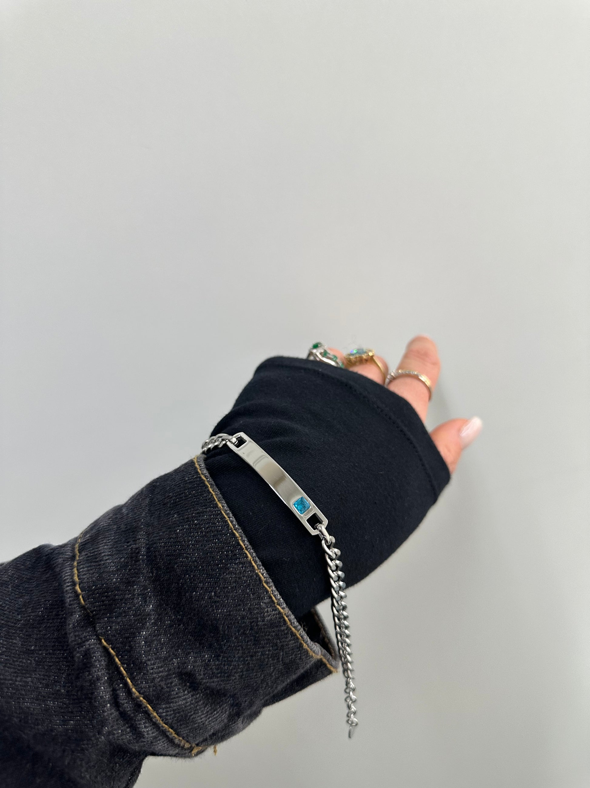 BRACCIALE ACCIAIO CON TARGA E ZIRCONE