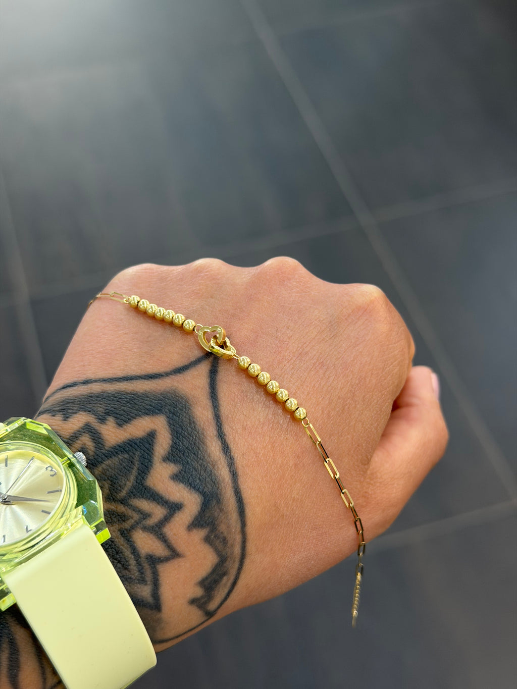 BRACCIALE ORO 18KT CUORI INTRECCIATI