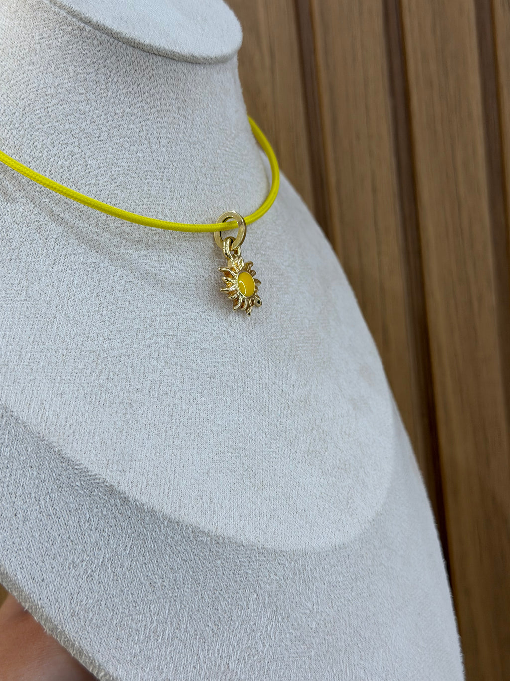 COLLANA CALAMITA CON CIONDOLO SOLE ORO 18KT