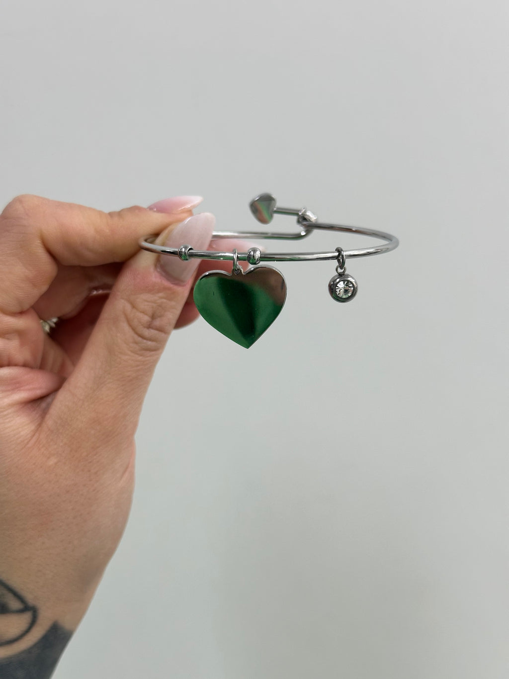 BRACCIALE RIGIDO ACCIAIO CON CUORE
