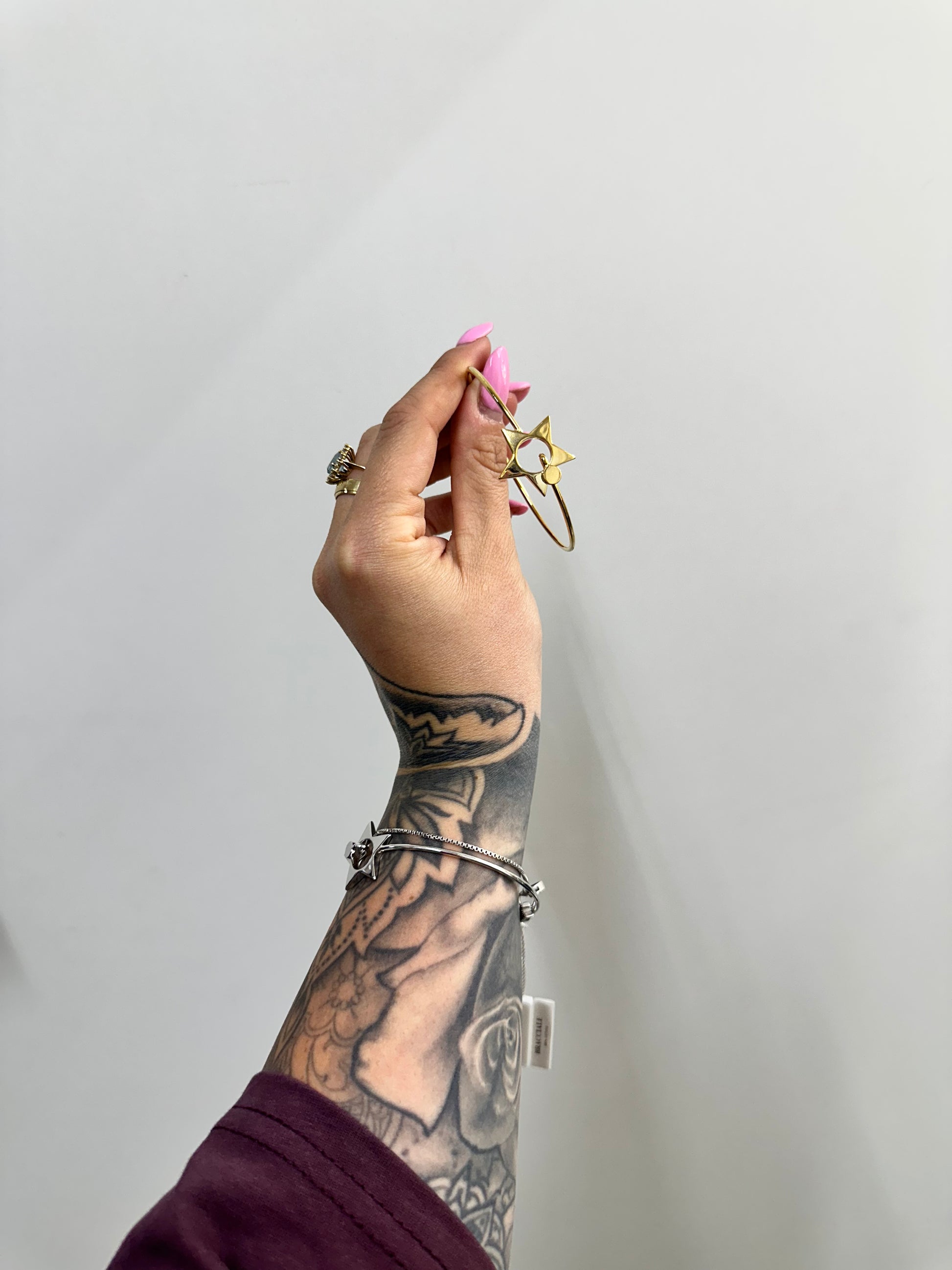 BRACCIALE RIGIDO CON STELLA ACCIAIO