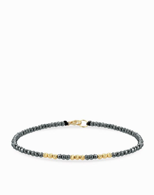 BRACCIALE A LACCIO CON EMATITE E SFERE IN ORO GIALLO DALU'