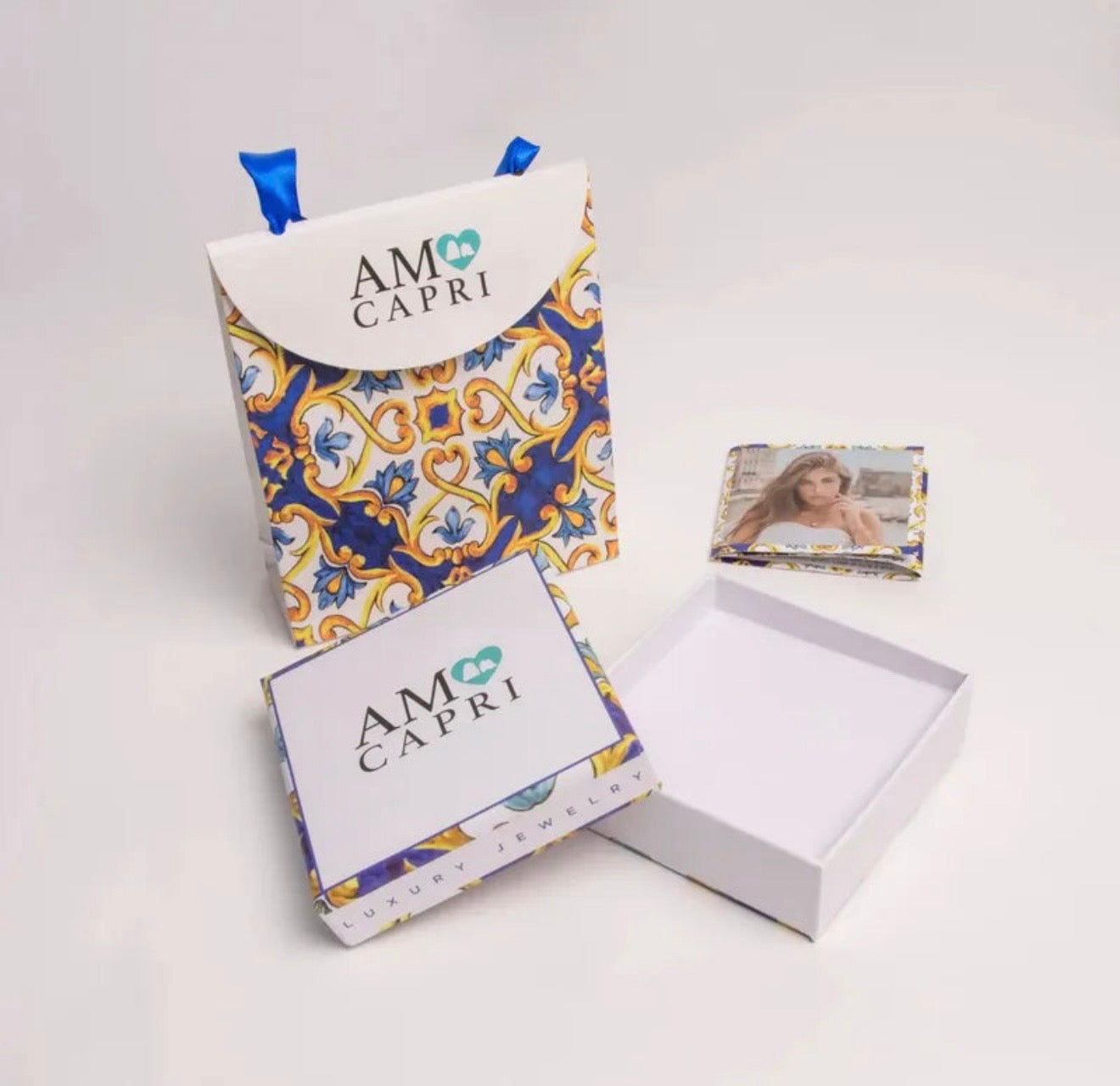 BRACCIALE AMO CAPRI MULTIFILO CAMPANA ROSA E CUORI PENDENTI