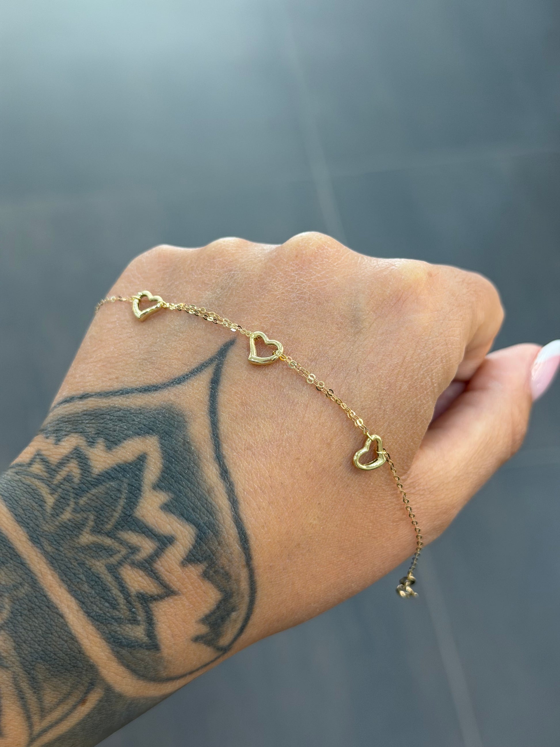 BRACCIALE ORO 18KT 3 CUORI