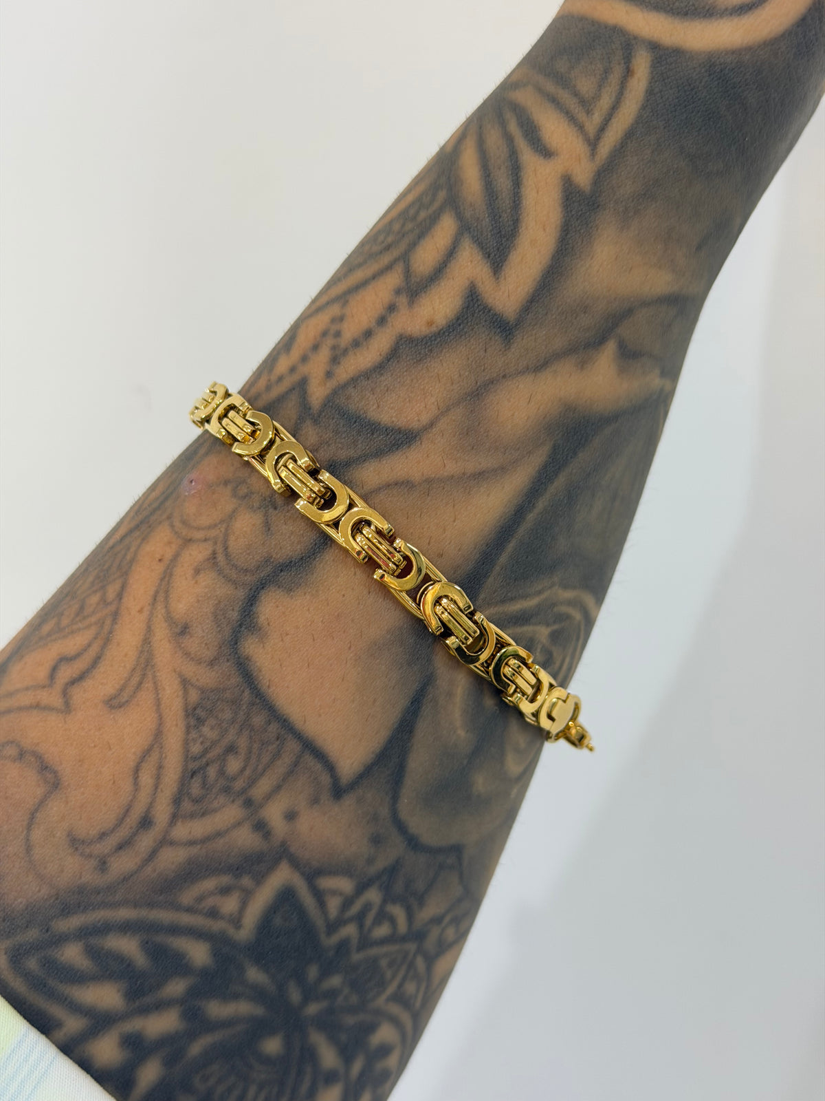 BRACCIALE ENEA ACCIAIO CON DORATURA