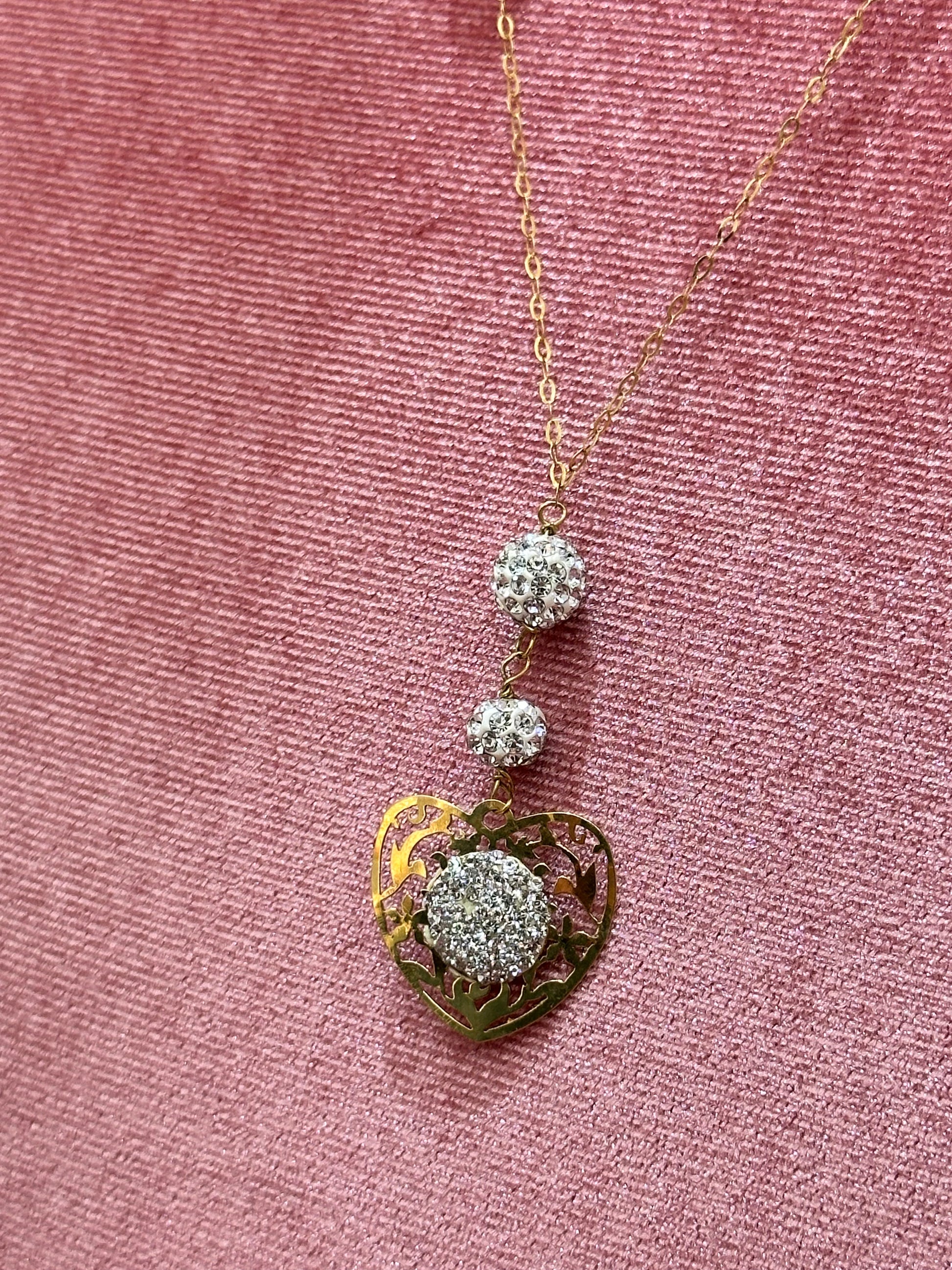 COLLANA CON CUORE E SFERE ORO 18KT