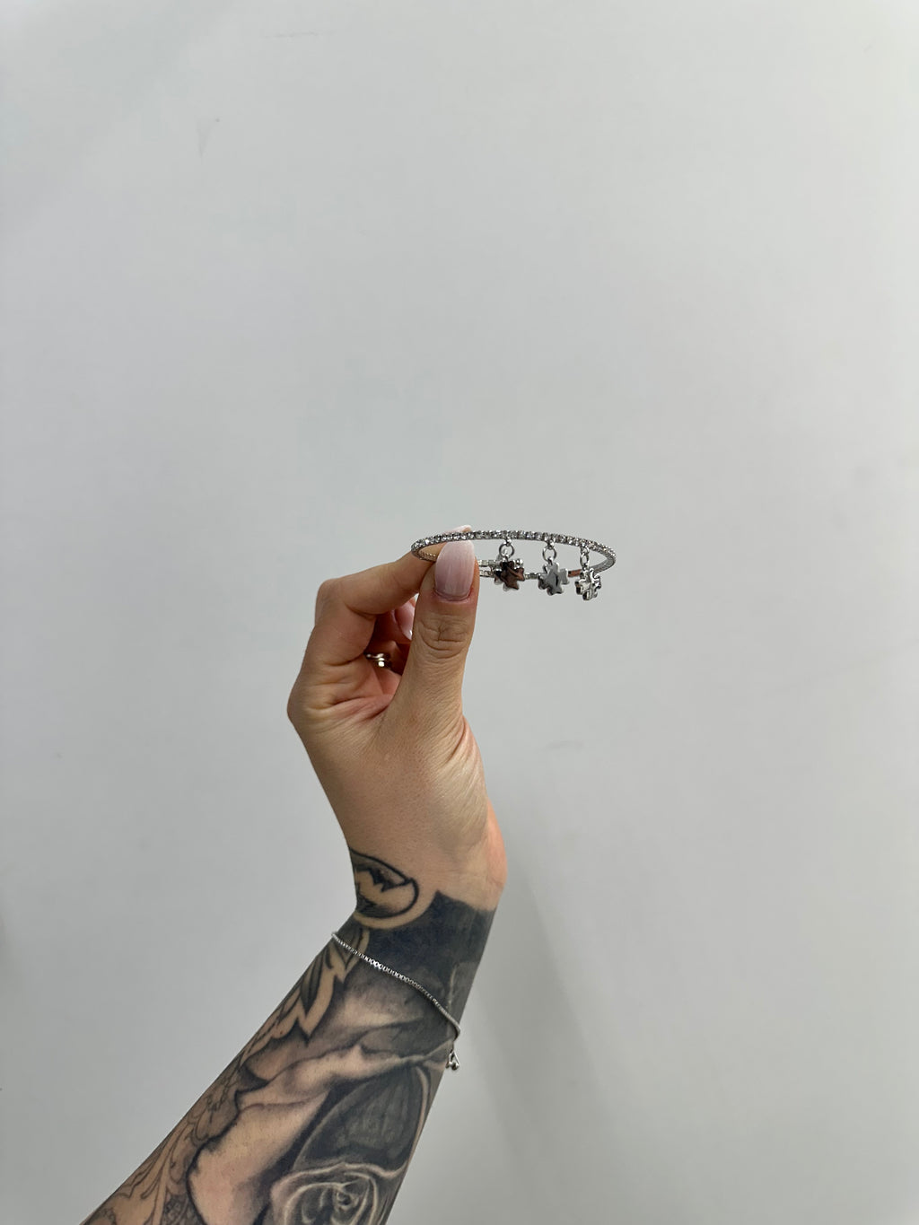 BRACCIALE TENNIS QUADRIFOGLI PENDENTI