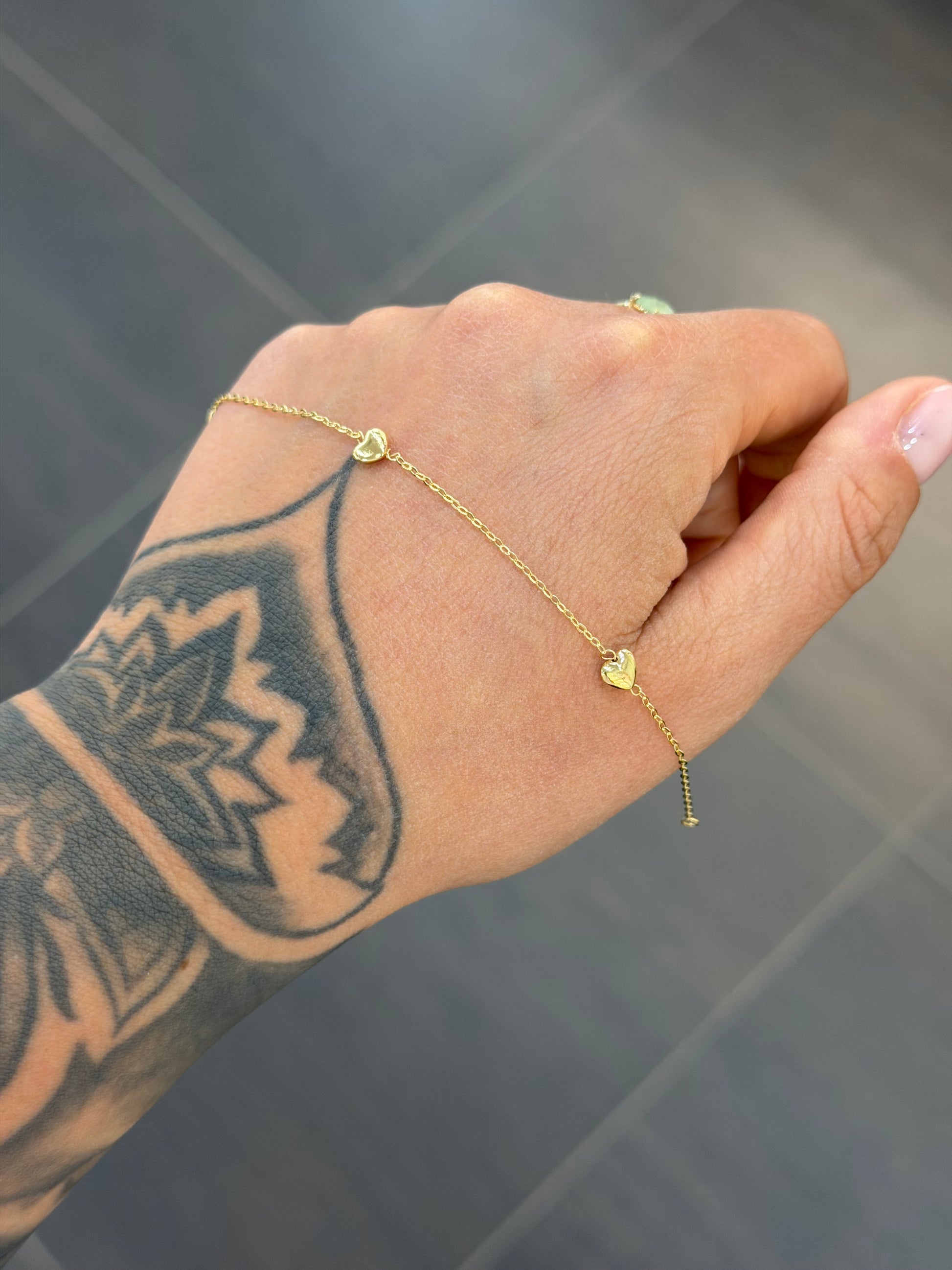 BRACCIALE ORO 18KT CUORI BOMBATI