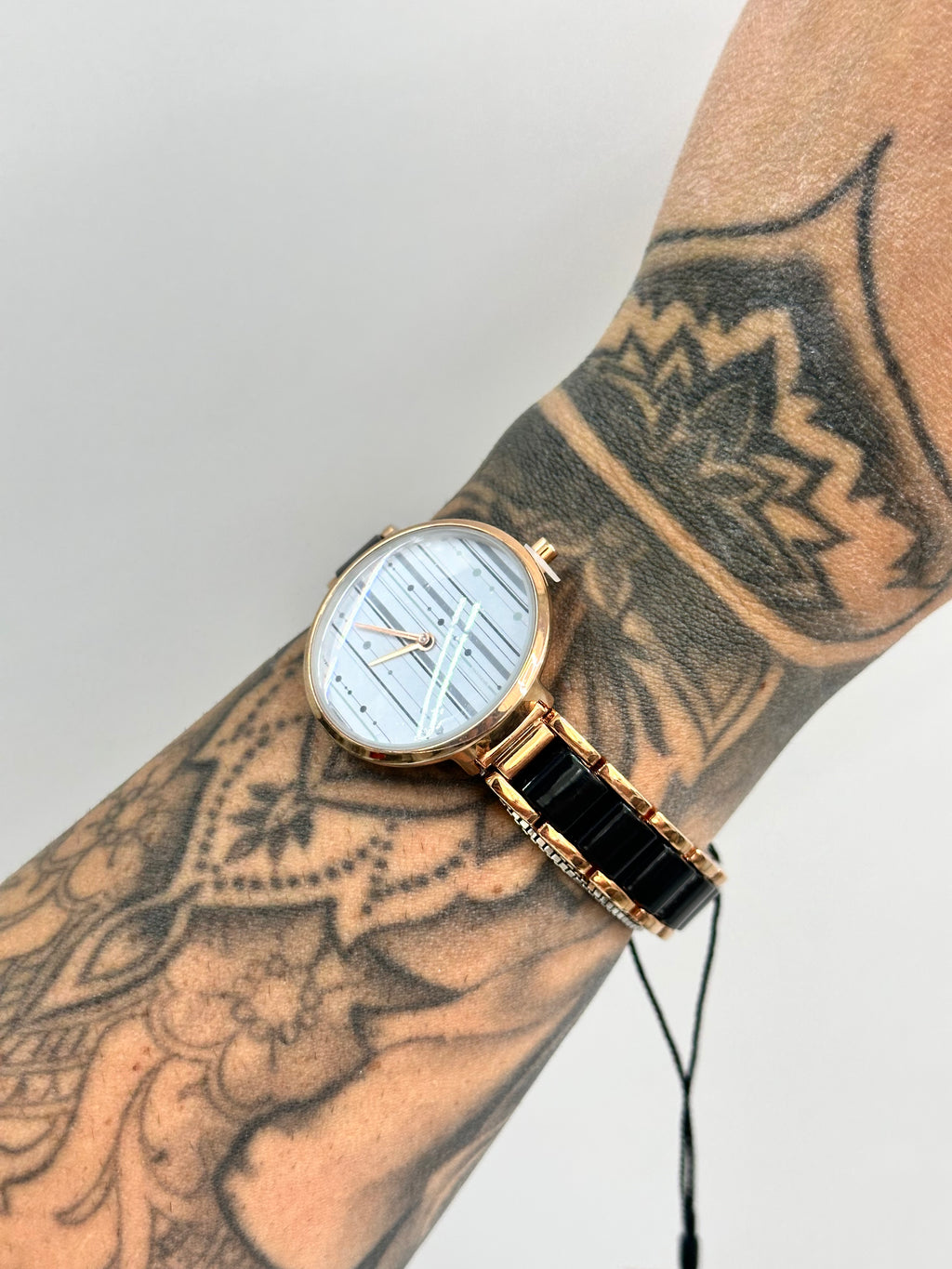 OROLOGIO NAJ-OLEARI NERO E ORO ROSA