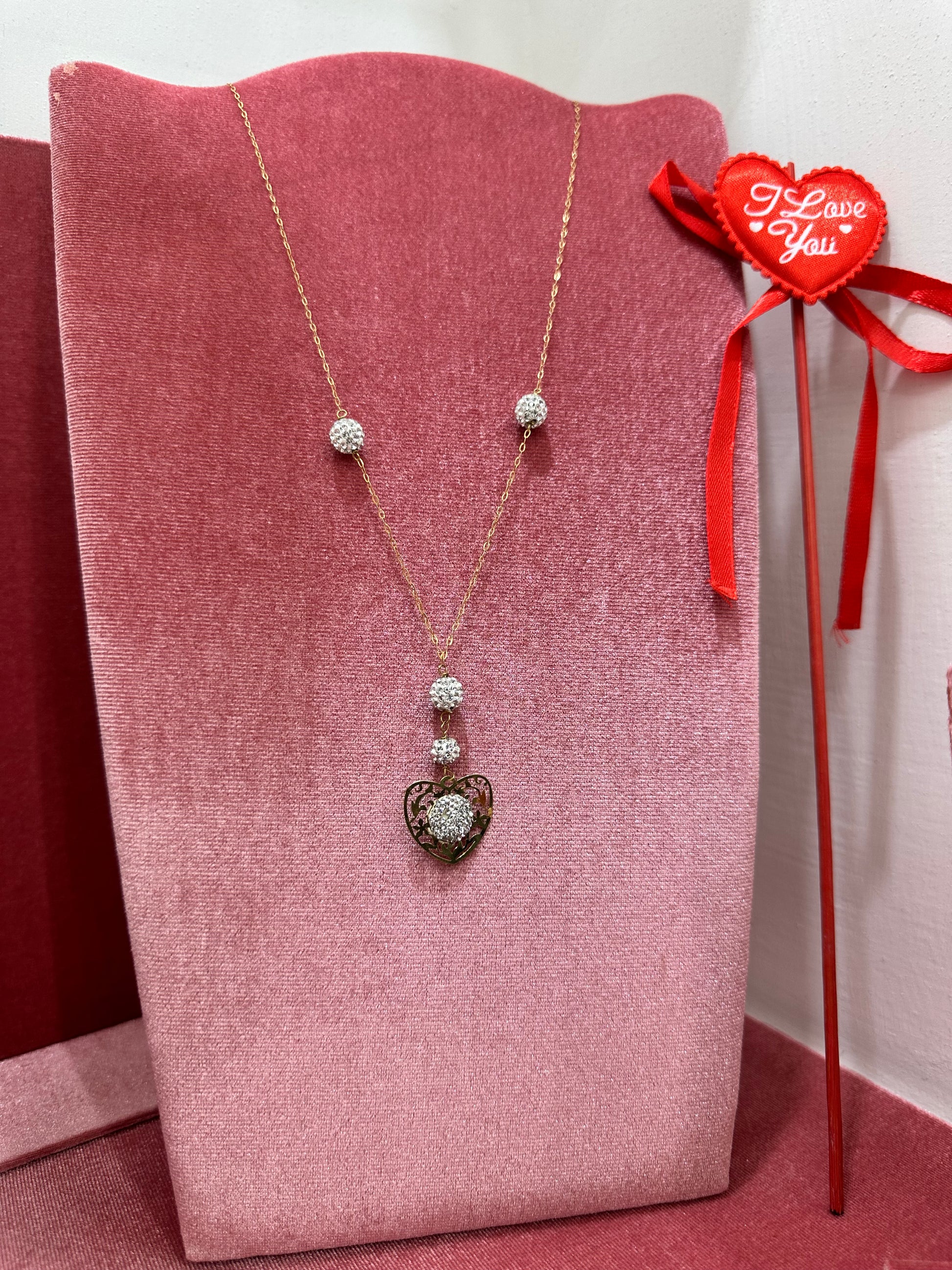 COLLANA CON CUORE E SFERE ORO 18KT