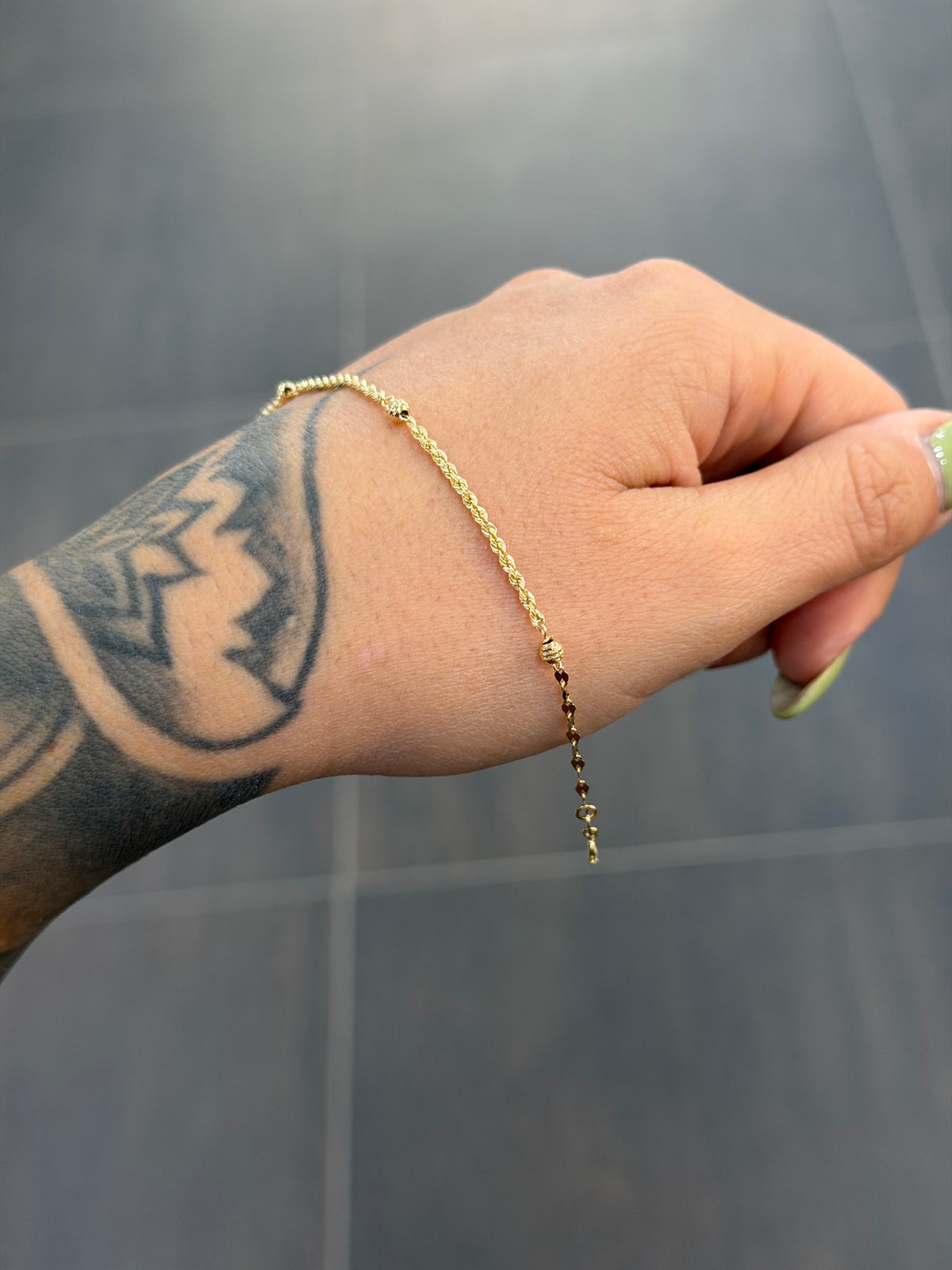 BRACCIALE ORO 18KT LASER CON SFERE
