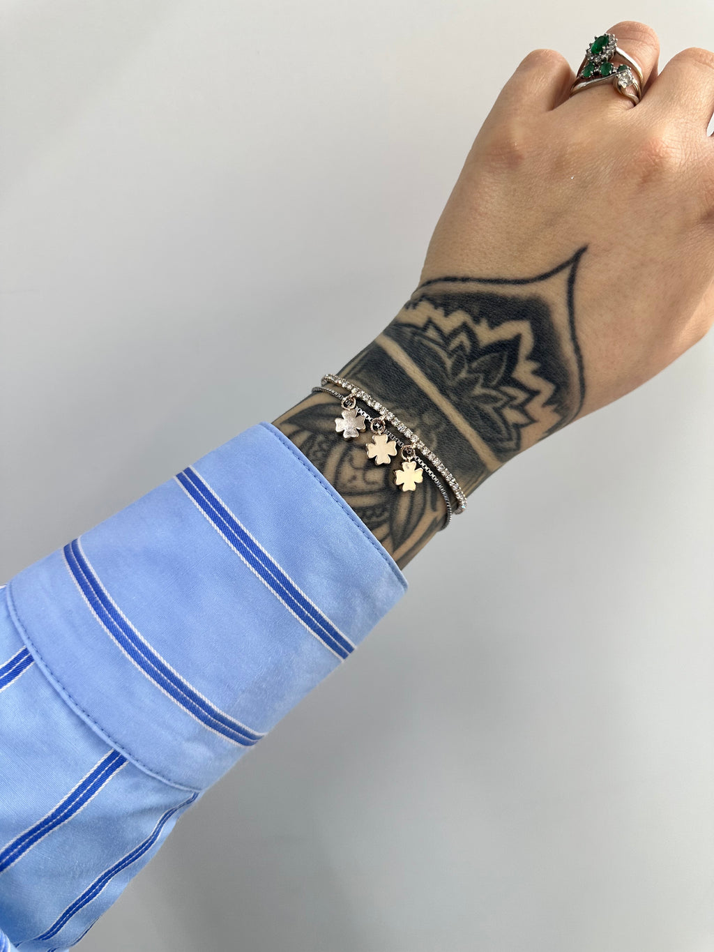 BRACCIALE TENNIS QUADRIFOGLI PENDENTI