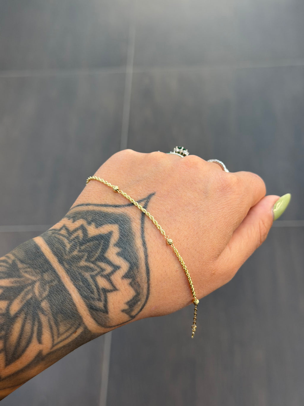 BRACCIALE ORO 18KT LASER CON SFERE
