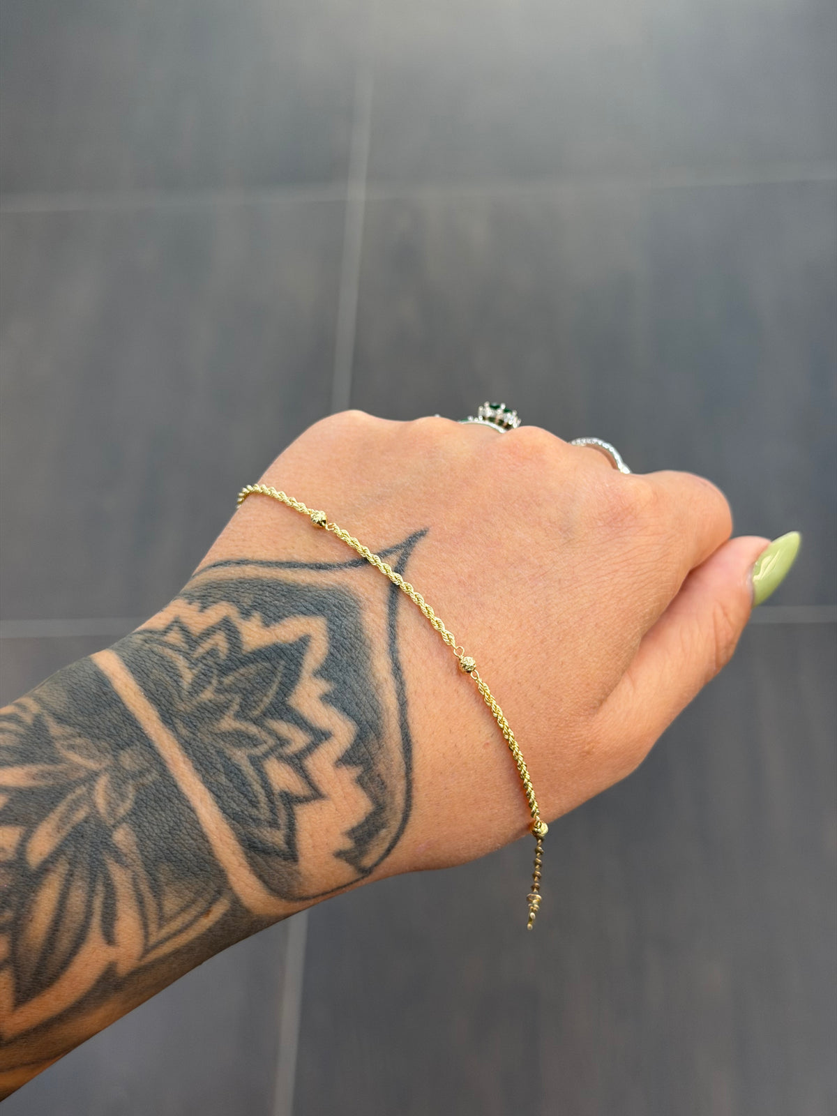 BRACCIALE ORO 18KT LASER CON SFERE