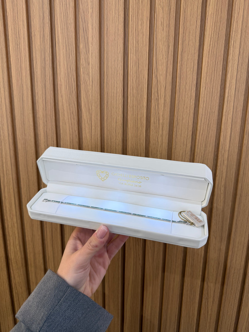 BRACCIALE TENNIS IN ORO 18KT DIAMANTI E SMERALDI