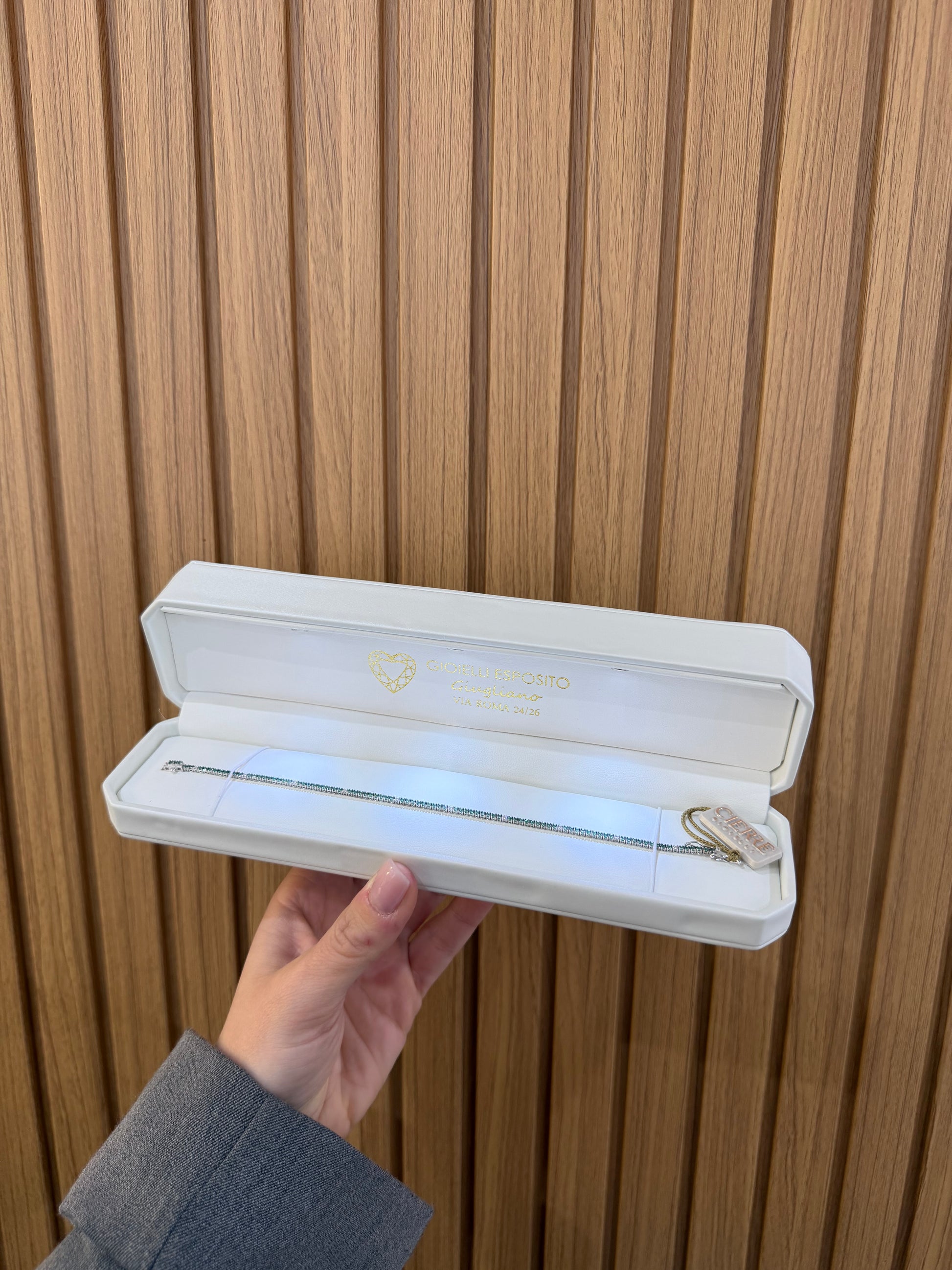 BRACCIALE TENNIS IN ORO 18KT DIAMANTI E SMERALDI