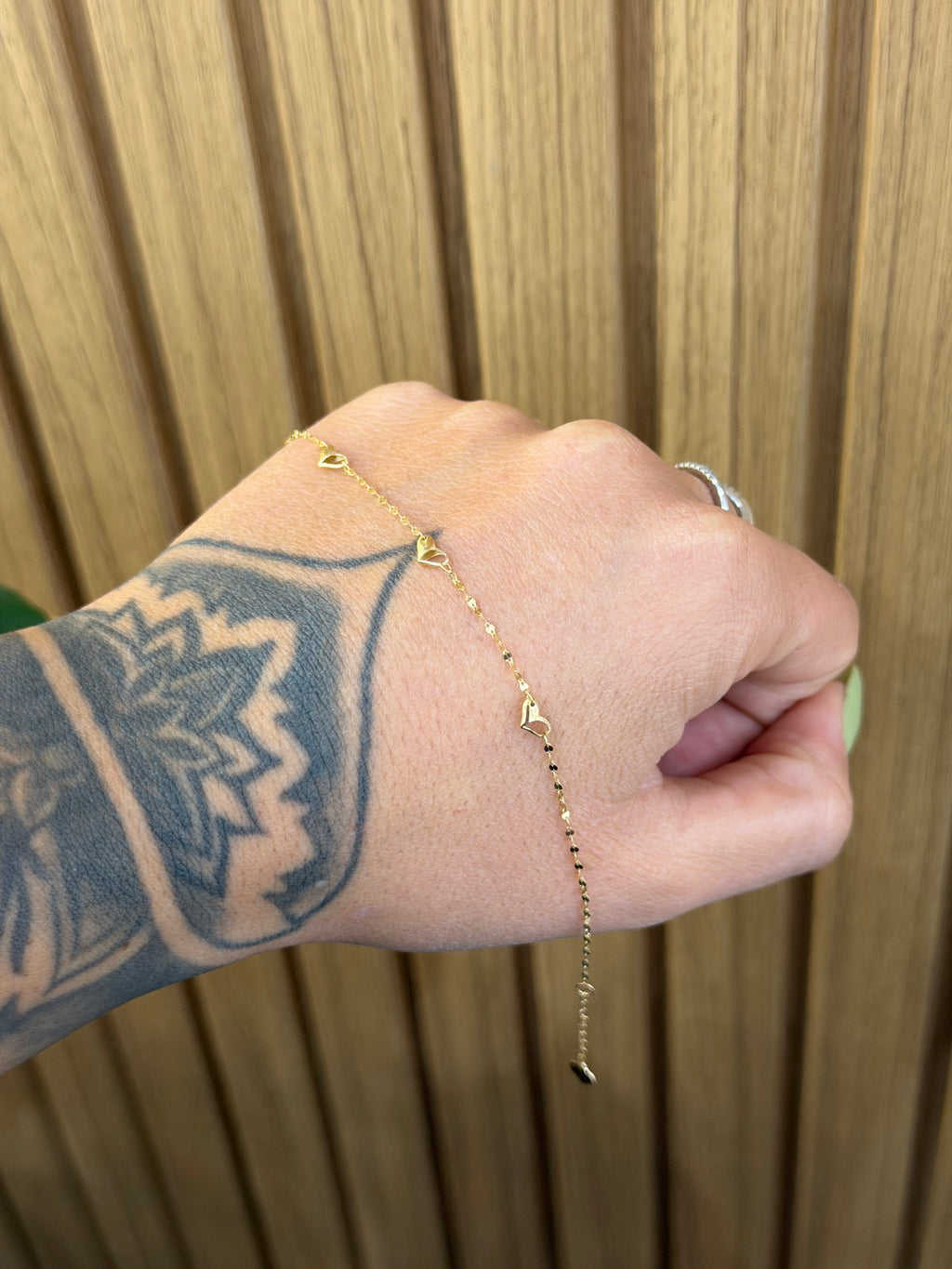 BRACCIALE ORO 18KT MINI CUORI