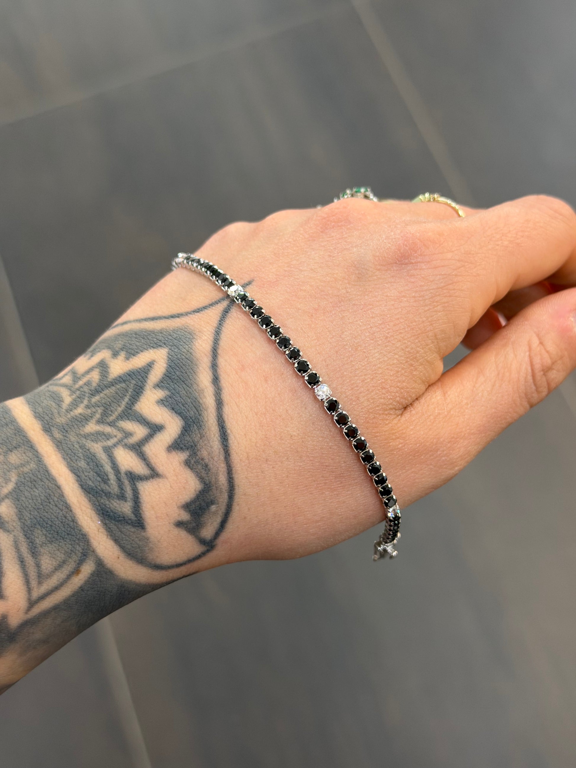 BRACCIALE TENNIS ORO 18KT CON ZIRCONI NERI E BIANCHI
