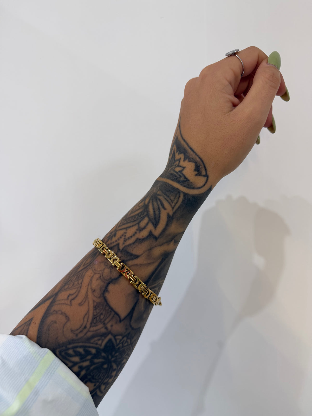 BRACCIALE ENEA ACCIAIO CON DORATURA