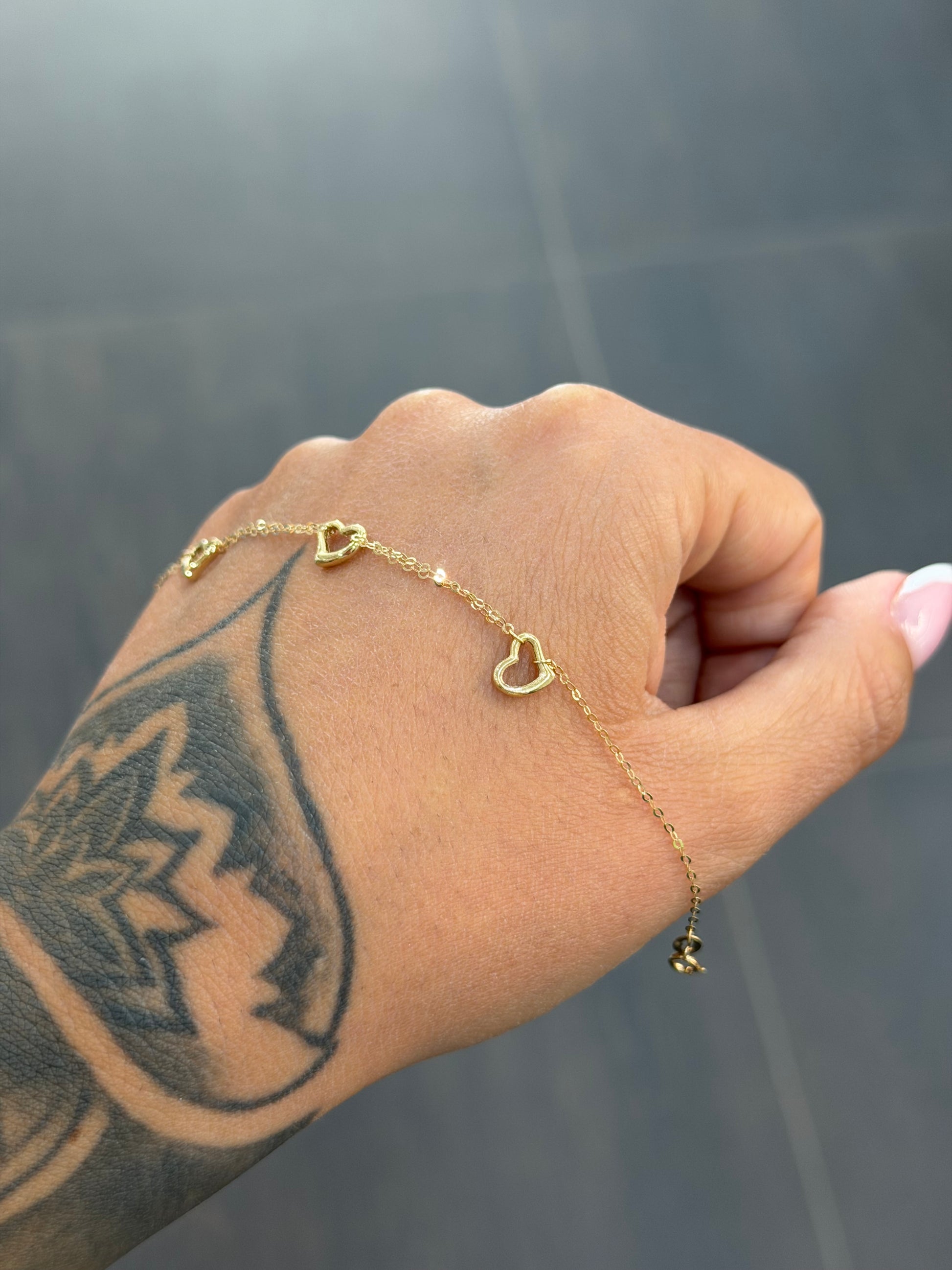 BRACCIALE ORO 18KT 3 CUORI