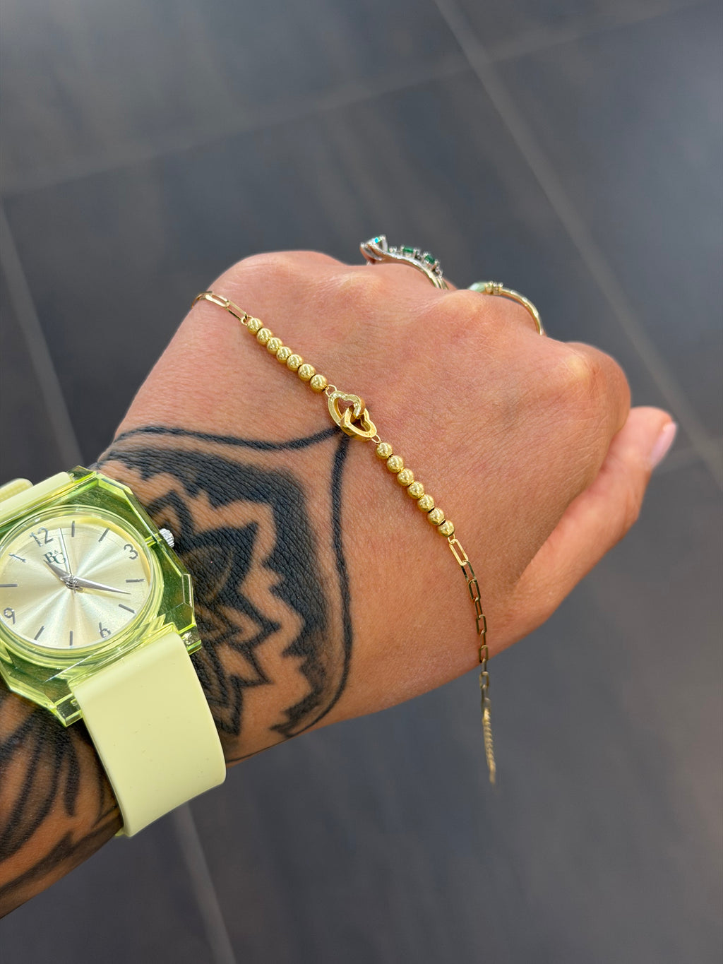BRACCIALE ORO 18KT CUORI INTRECCIATI