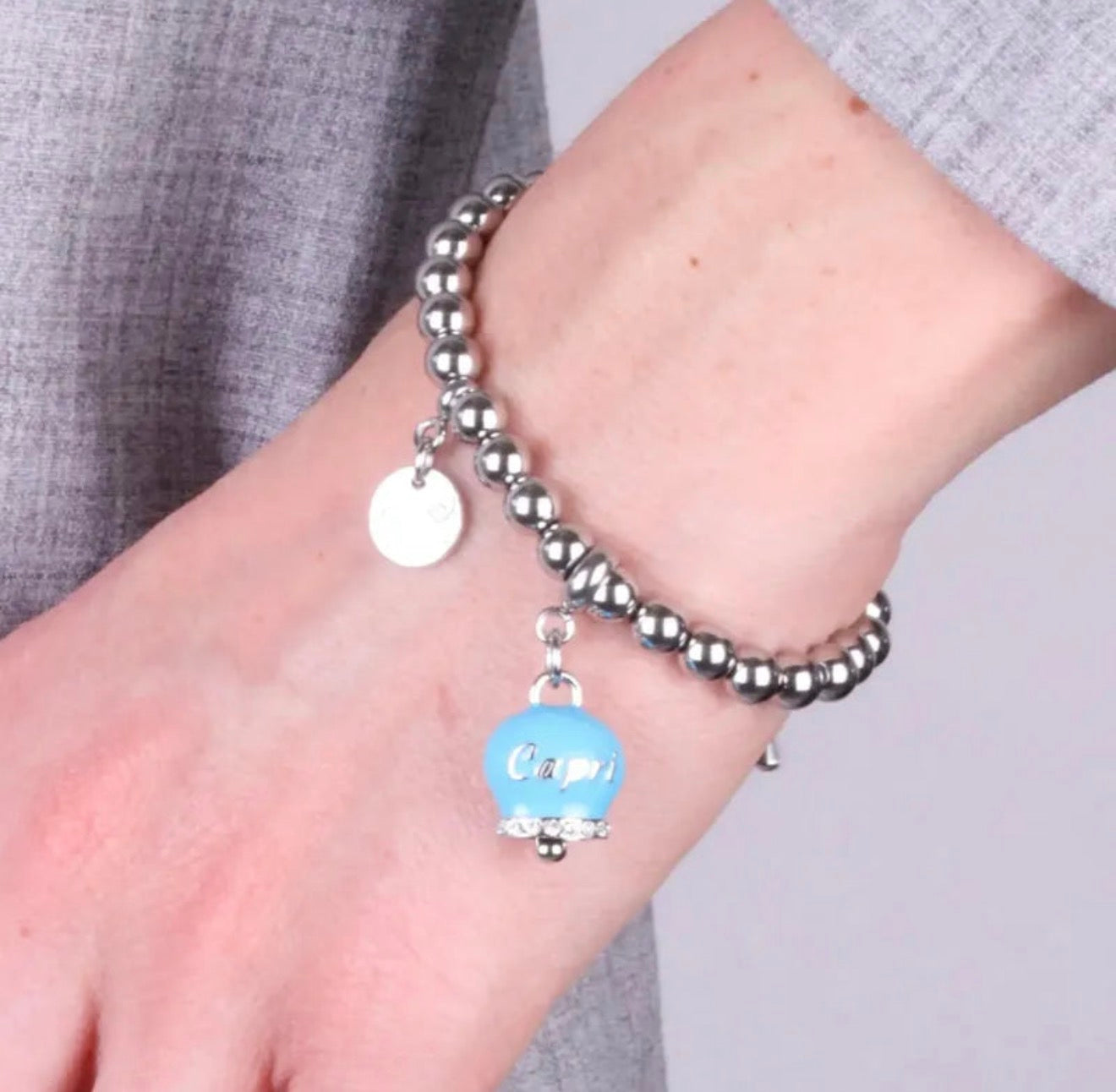BRACCIALE AMO CAPRI ACCIAIO CON CAMPANELLA CELESTE