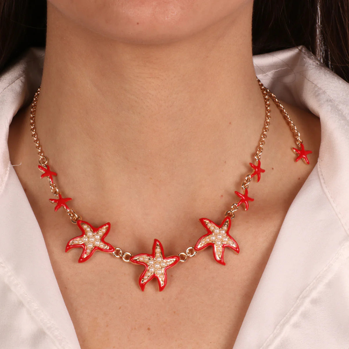 COLLANA IN METALLO CON STELLE MARINE ROSSE SANTORINI