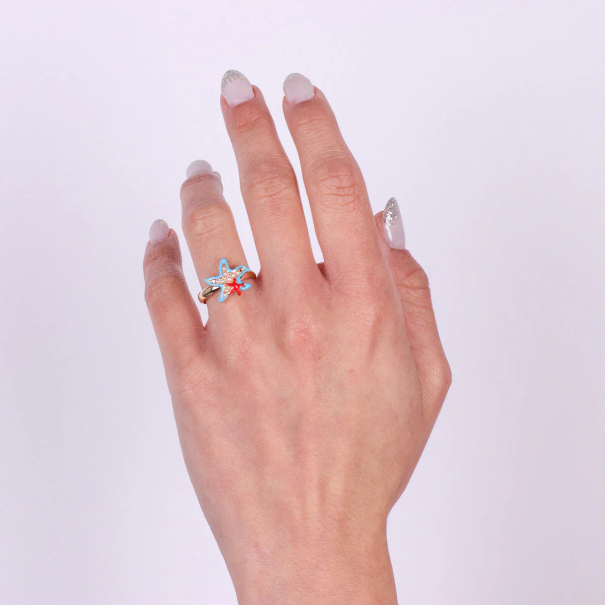 ANELLO IN METALLO CON STELLE MARINE SANTORINI
