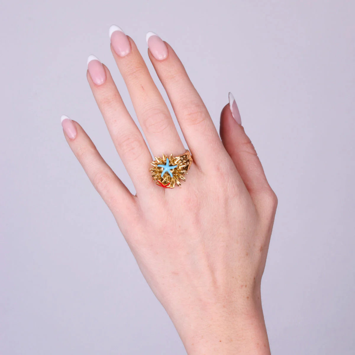 ANELLO IN METALLO CON RICCIO DI MARE AMO CAPRI