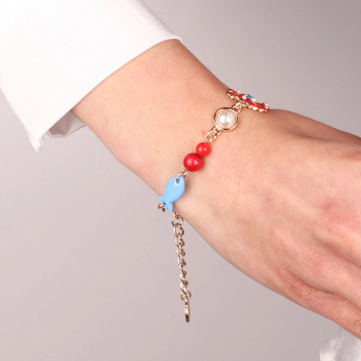 BRACCIALE IN METALLO CON SIMBOLI MARINI SANTORINI